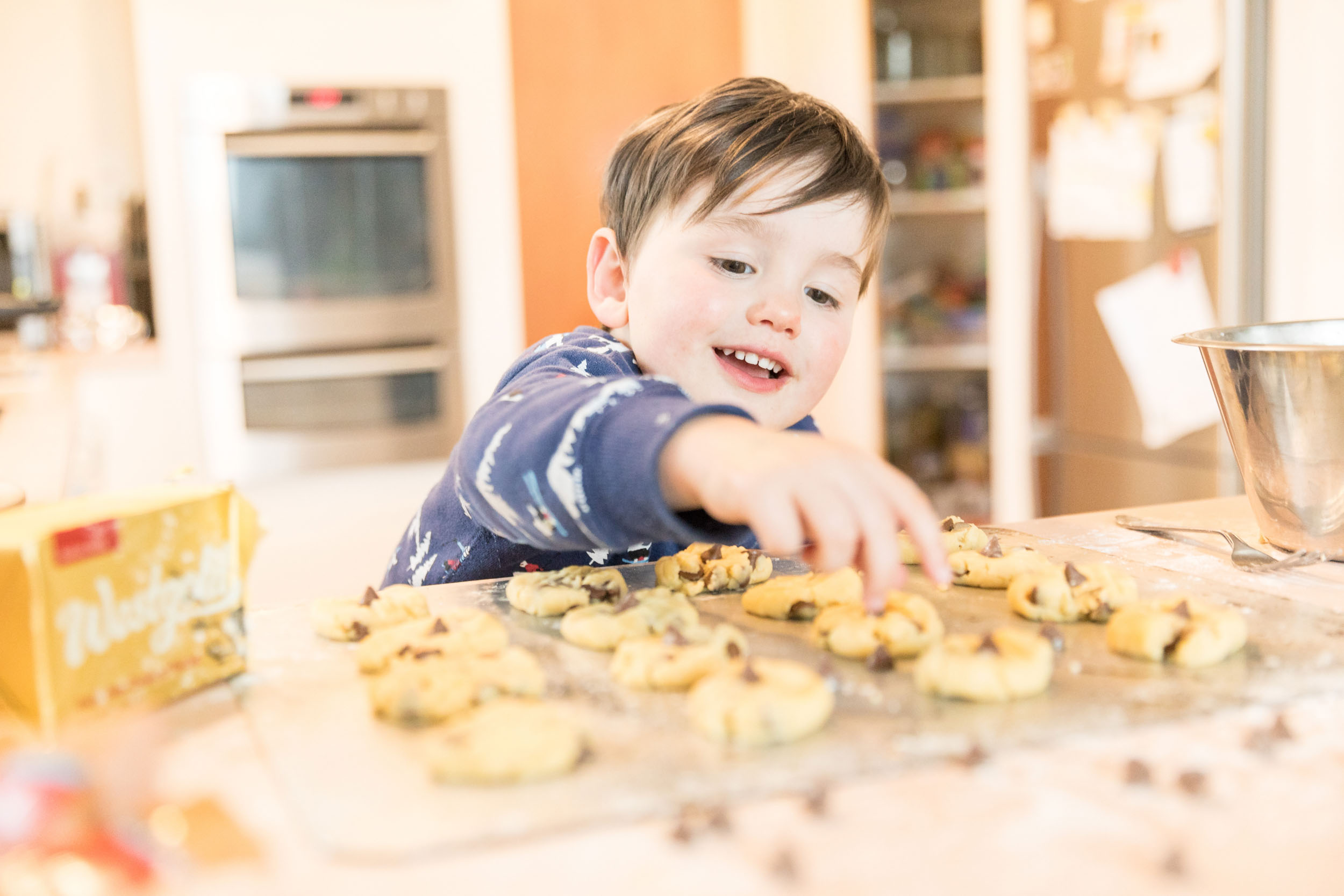 Butter advertising imagery of Josiah sneaking a cookie