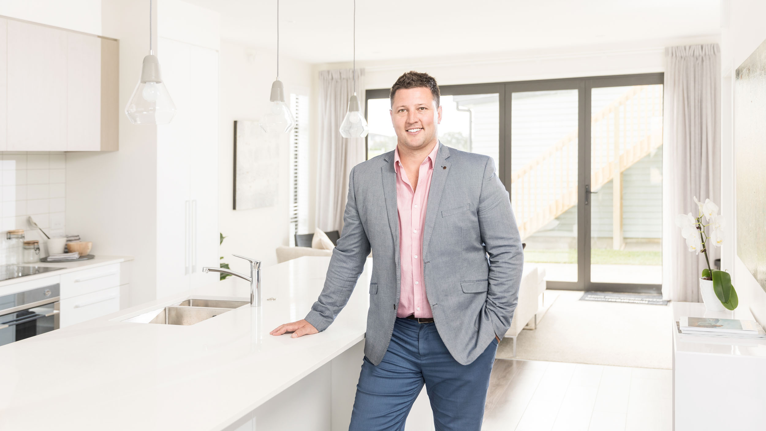 Commercial portrait of a Mike Greer Homes Auckland Salesperson